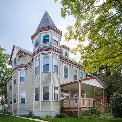 The exterior of the Chicago Heights Home, a three-story victorian style shared multi-family building.